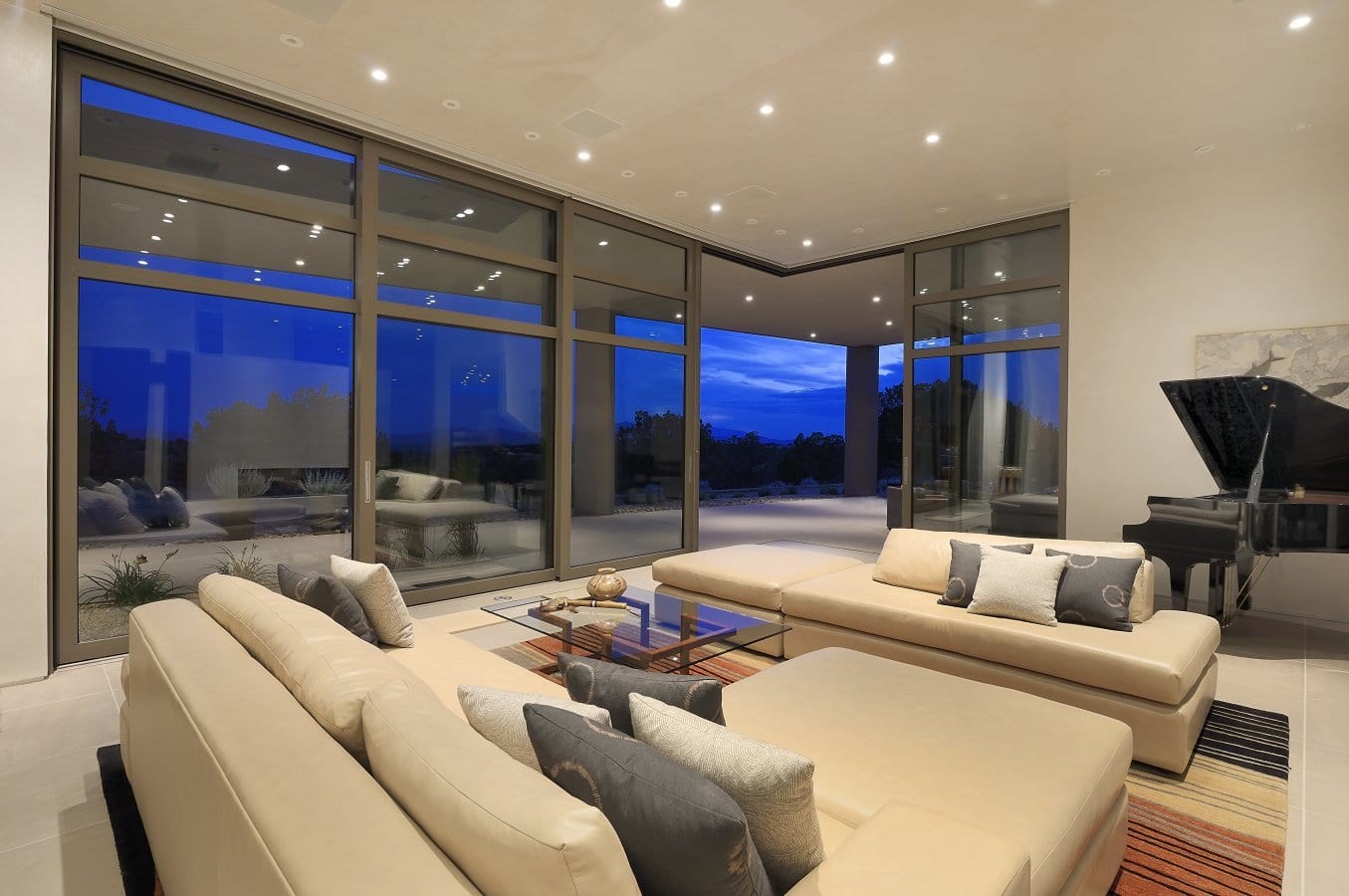 Massive aluminum lift and slide doors that meet in the corner, interior view